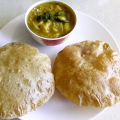 Wheat poori with potato masala A picture of Wheat poori with potato masala.