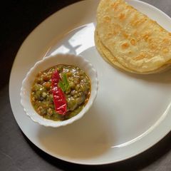A picture of Sarson saag in Punjabi style in the pressure cooker in 20 mins.