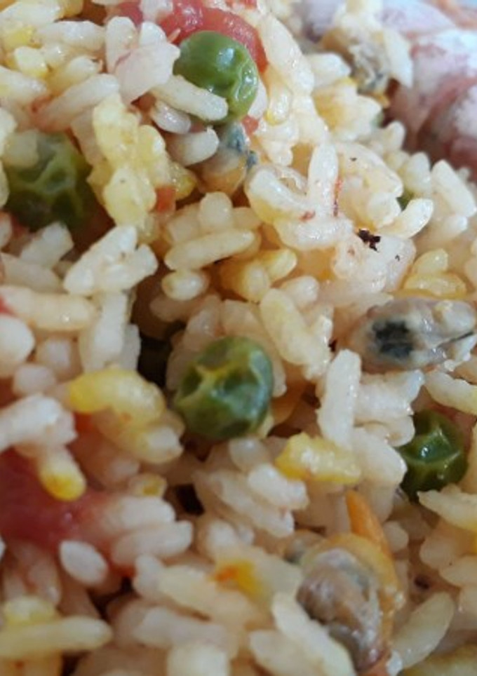 Una foto de Arroz con berberechos al horno
