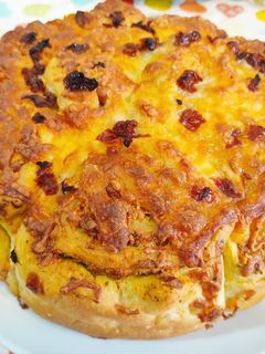 Una foto de TartaRoll de pesto de pistacho, mozzarella y tomates secos