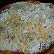 Pizza con huevo y jamón