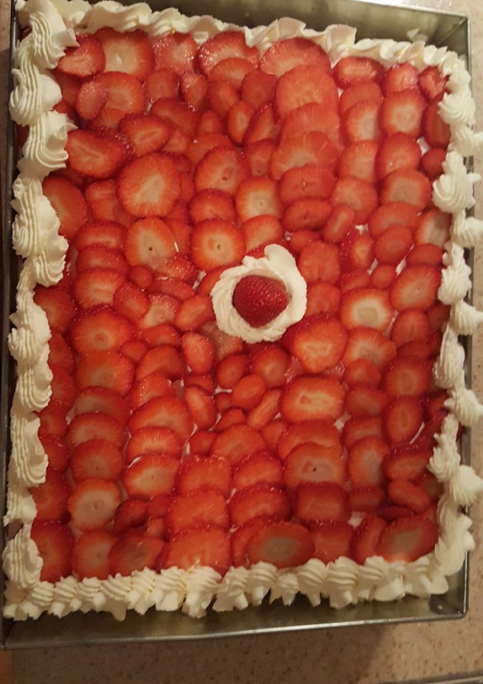 Una foto de Tarta de fresas y nata