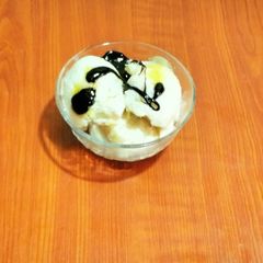 Vanilla Flavoured Ice cream with Chocolate Ganache A picture of Vanilla Flavoured Ice cream with Chocolate Ganache.