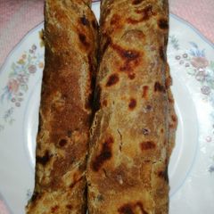 Wholegrain chapati with onion and coriander A picture of Wholegrain chapati with onion and coriander.