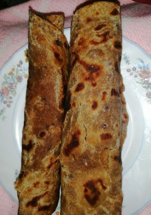 A picture of Wholegrain chapati with onion and coriander.