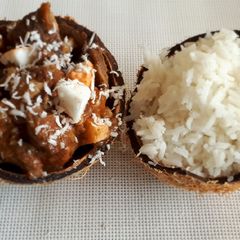A picture of Chevon served with coconut rice#myricedish.
