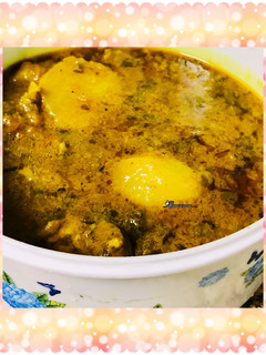 A picture of Baby Potatoes mutton curry.