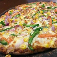 Corn capsicum pizza A picture of Corn capsicum pizza.
