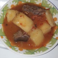 A picture of Yam soup with goat meat.