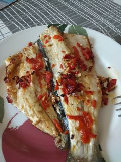 Una foto de 🐟 Lubina con piquillos