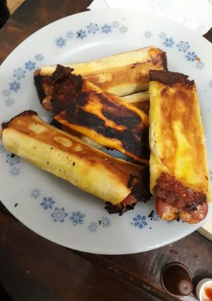 Una foto de Salchichas envueltas rellenas de queso saborizadas