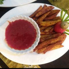 Spicy fries 🍿 #fastfood A picture of Spicy fries 🍿 #fastfood.