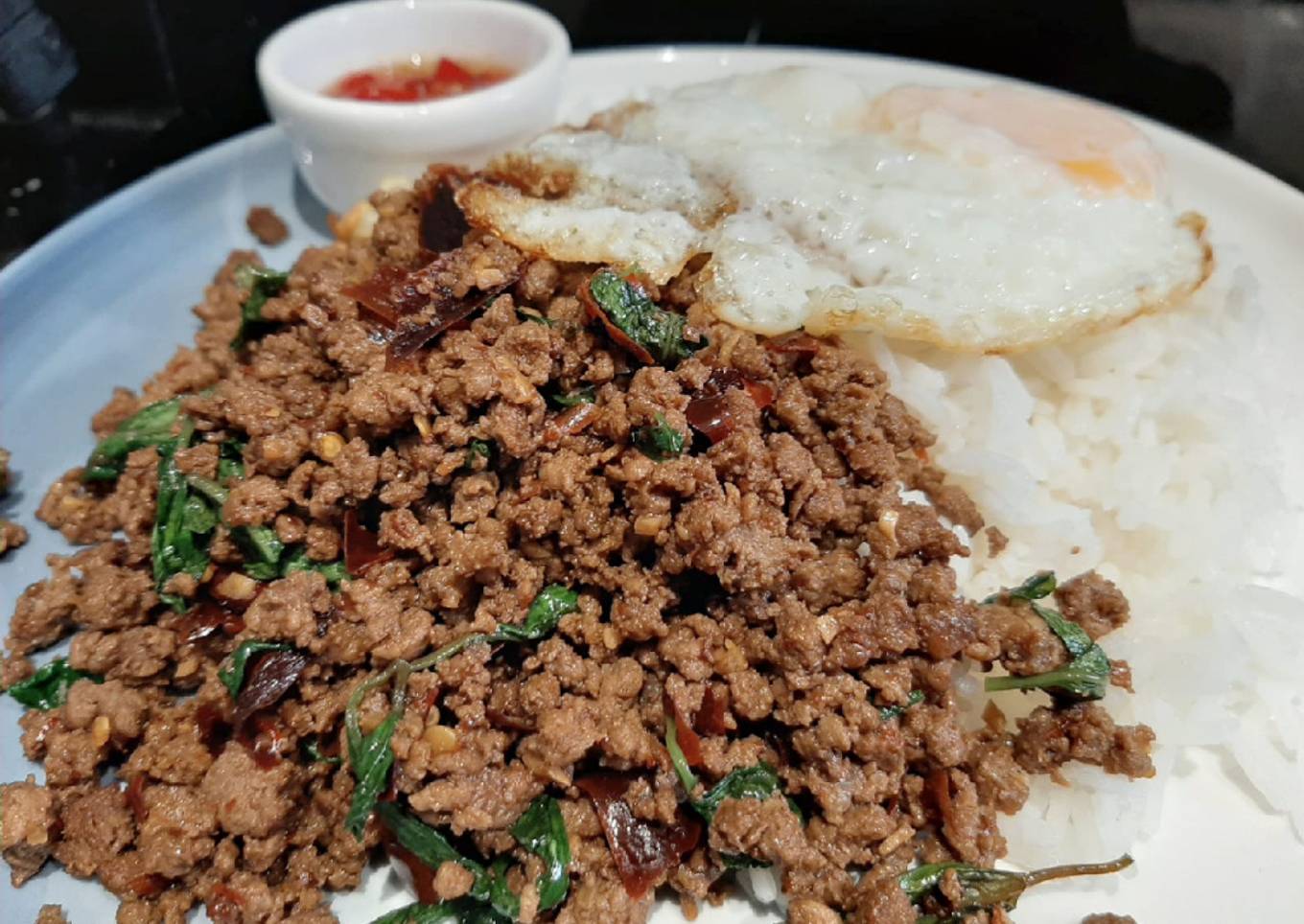 My version of Thai Basil Beef (Pad Ka Prao) with dried chillies, topped with fried eggs