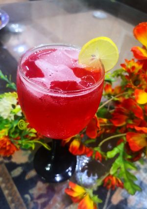 A picture of Traditional lal sharbat with lemon.