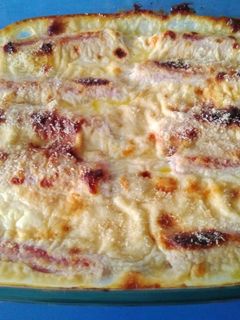 Una foto de Espárragos blancos gratinados con bechamel al horno
