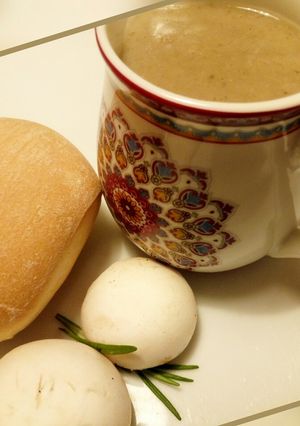 A picture of Bread and mushroom sauce.