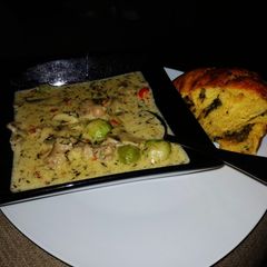 A picture of Mushroom and sausage soup.