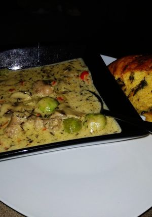 A picture of Mushroom and sausage soup.