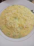 Polenta con quesos y un toque de perejil al "Tun tun"