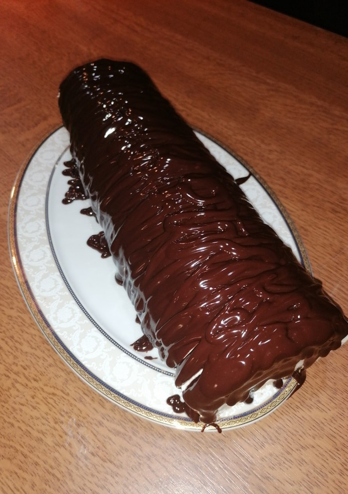 A picture of Swiss Roll (Sponge Cake with Whipped Cream and Ganache) 🤤.