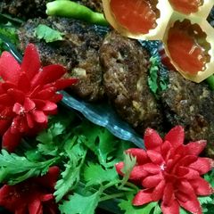 A picture of Chapli kabab by Amna's Kitchen.