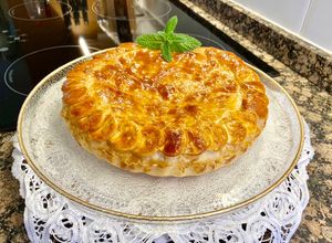 Foto principal de Pizza rústica de hojaldre con pavo y queso Provolone