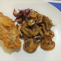 A picture of Parmesan-crusted Chicken Breast with Roasted Mushrooms.