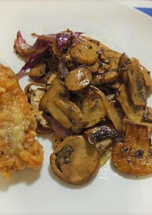 A picture of Parmesan-crusted Chicken Breast with Roasted Mushrooms.
