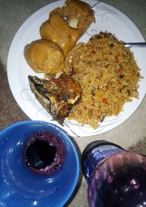 A picture of Moi moi/jallof rice /fish.