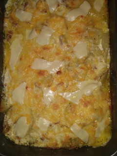 Una foto de Patatas con bacon, nata de cocinar y queso 😋