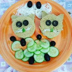 A picture of Cucumber and cheese sandwich.