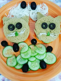 A picture of Cucumber and cheese sandwich.