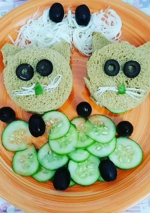 A picture of Cucumber and cheese sandwich.