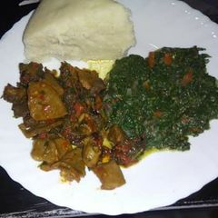 A picture of Tripe (Matumbo) fried, Kunde and Ugali.