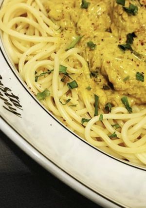Une photo de Poulet au curry sauce crème