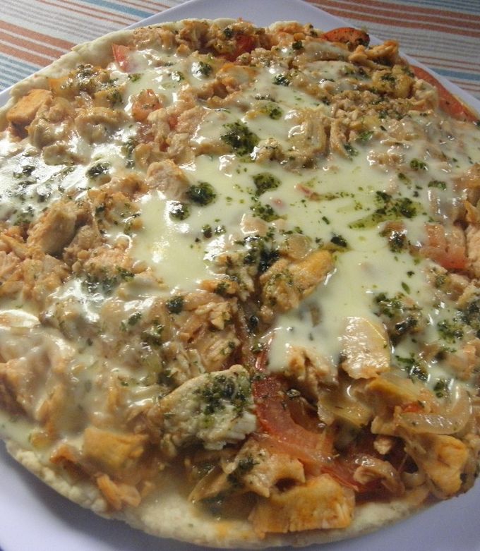Una foto de Pizza de atún y queso