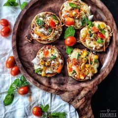 A picture of Mini Rava  Veg Pizza(Tawa).