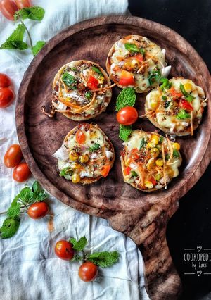 A picture of Mini Rava  Veg Pizza(Tawa).