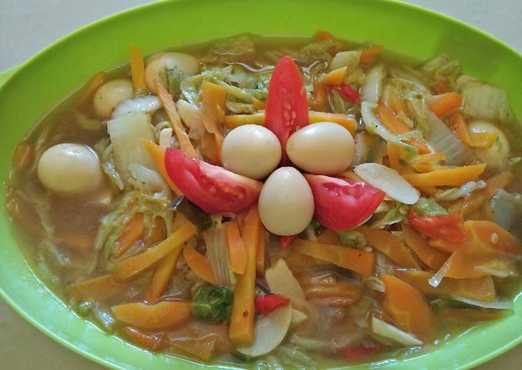 Tumis sawi putih, telur puyuh dengan saus tiram