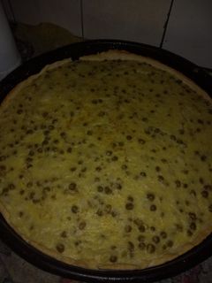 Una foto de Tarta de choclo y arvejas. Hiper fácil