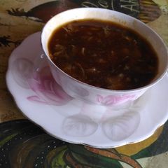 A picture of Corn soup in chinese style.