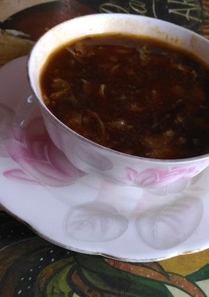 A picture of Corn soup in chinese style.