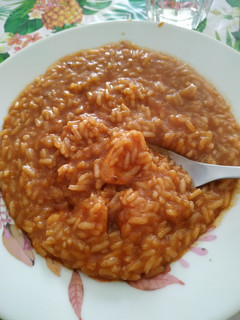 Una foto de Arroz meloso con pollo