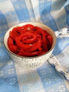 Una foto de Pimientos rojos confitados