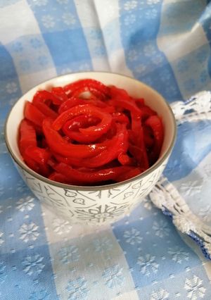 Una foto de Pimientos rojos confitados