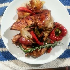 A picture of Roast Chicken - on Stove top in a Dutch Oven.