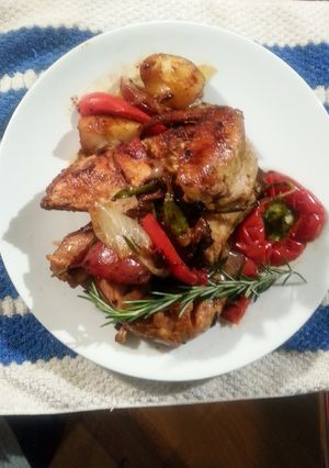 A picture of Roast Chicken - on Stove top in a Dutch Oven.
