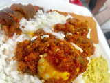Rice and pepper sauce with pomo and boiled egg