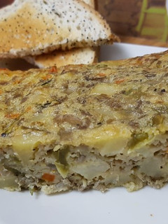 Una foto de Pastel salado de verduras variadas (Drob de verdețuri variate)