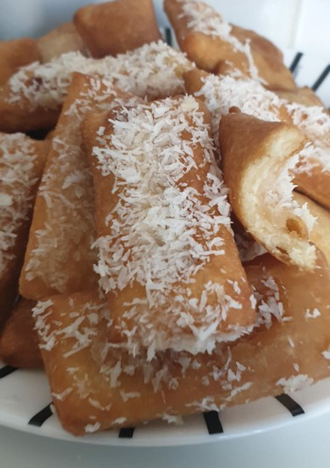 Una foto de Bocaditos rellenos de mermelada de naranja y coco rallado